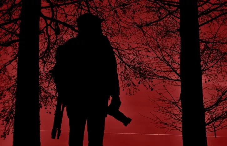 Silhouette of a photographer - red team