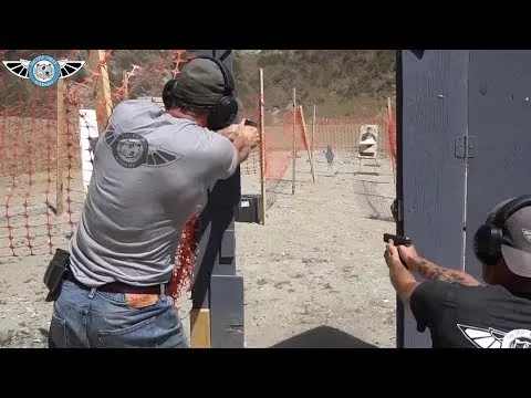Man discharging firearm in gun range -PWA GI Bill