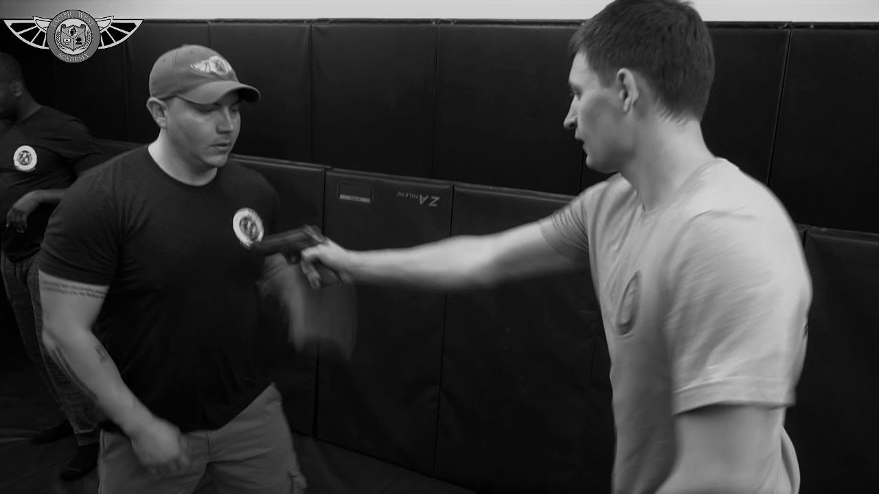 student and teacher at PWA.edu practicing the Krav - Combative course