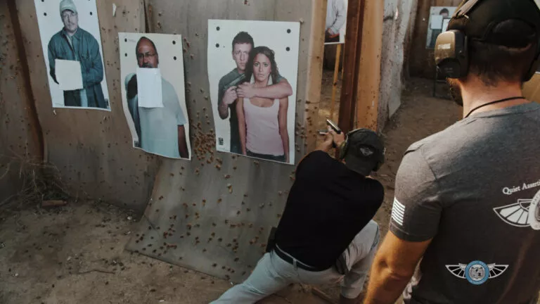 Certified Protection Specialist students practicing firearms scenario training